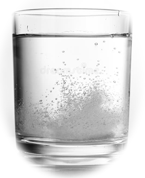 Antacid tablet fizzing in acid